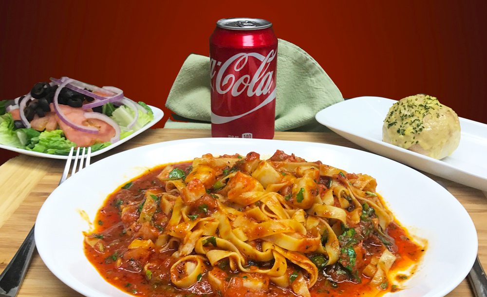 Pasta in Bowl with Salad and Soda from an Italian Catering Company in Pembroke Pines, FL