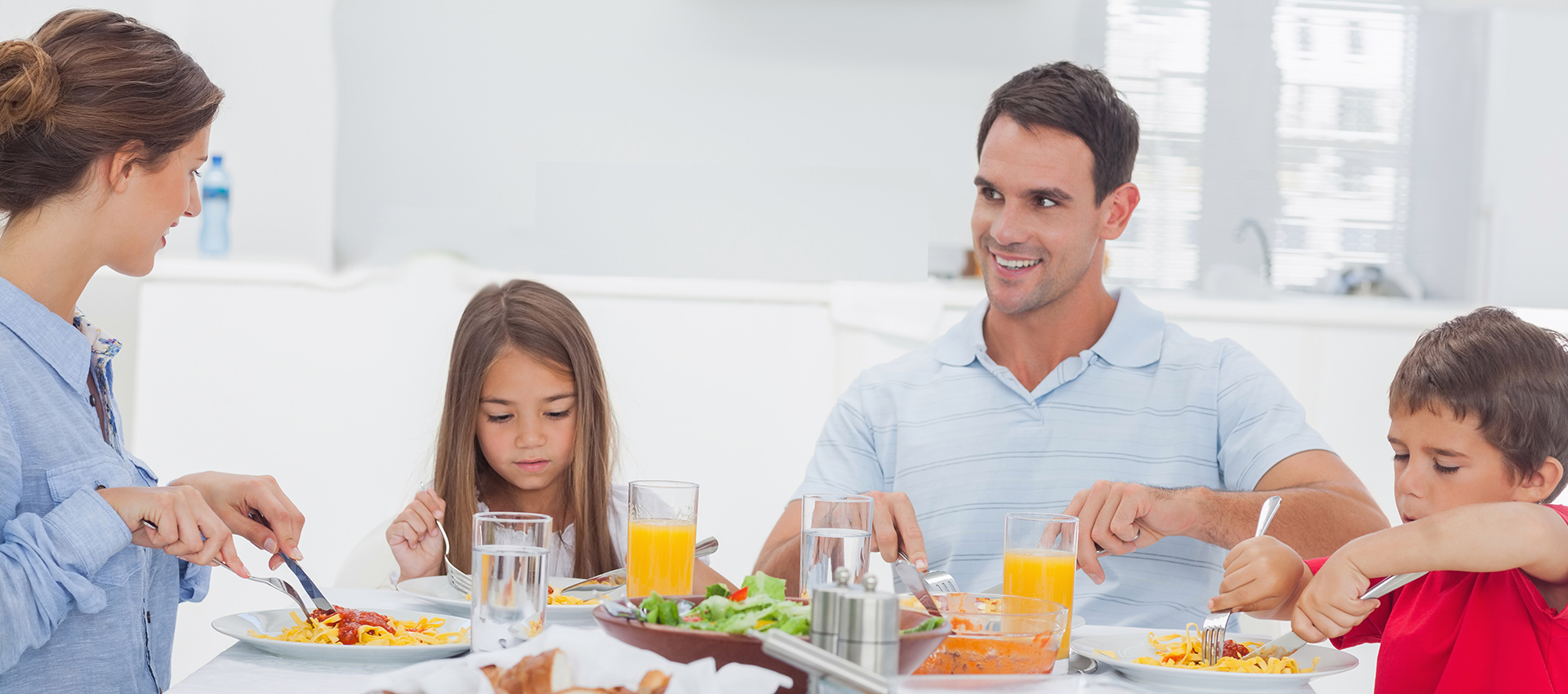 Family eating a meal from a pizza restaurant in Weston 